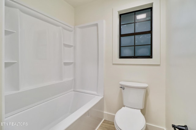 1122 N Shady Lane Loop, Clarkrange, TN 38553 - bathroom featuring baseboards, toilet, wood finished floors, and  shower combination