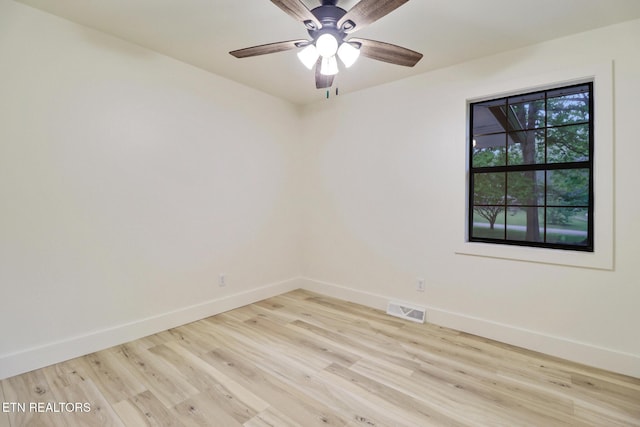 1122 N Shady Lane Loop, Clarkrange, TN 38553 - empty room with baseboards, light wood-type flooring, and a ceiling fan