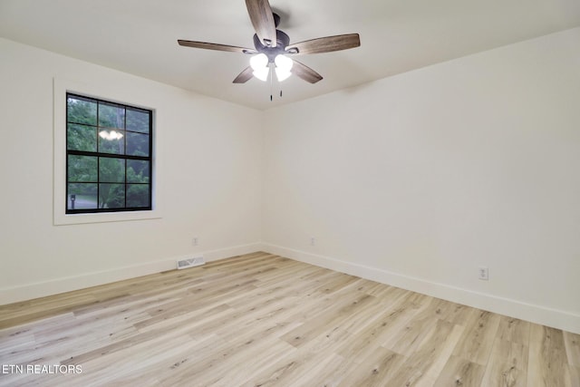 1122 N Shady Lane Loop, Clarkrange, TN 38553 - unfurnished room featuring light wood-style floors and baseboards