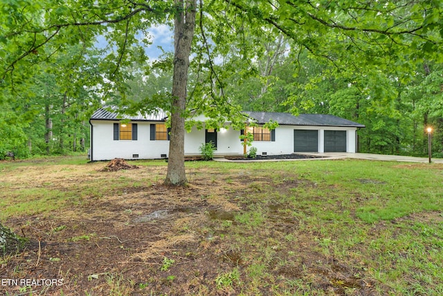 1122 N Shady Lane Loop, Clarkrange, TN 38553 - ranch-style home with metal roof, a garage, concrete driveway, a front yard, and crawl space