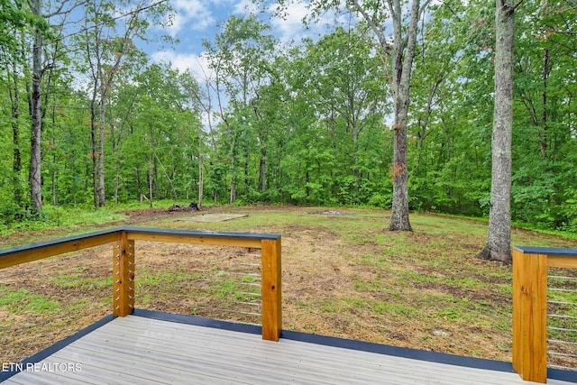 1122 N Shady Lane Loop, Clarkrange, TN 38553 - wooden terrace with a view of trees