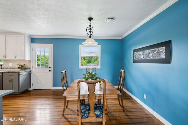 7613 Scenic View Dr, Knoxville, TN 37938 - dining area with a textured ceiling, dark wood-style flooring, baseboards, and ornamental molding