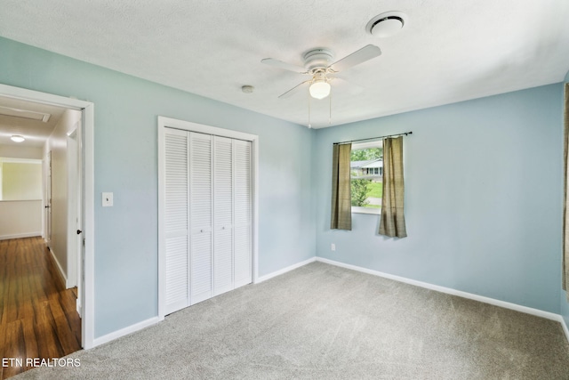 7613 Scenic View Dr, Knoxville, TN 37938 - unfurnished bedroom featuring a closet, baseboards, and carpet flooring
