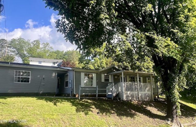 501 Park Ave, Clinton, TN 37716 - back of property featuring covered porch, crawl space, and a yard