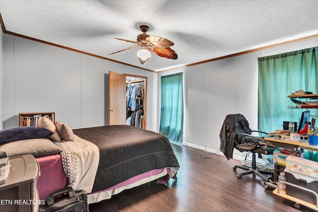 501 Park Ave, Clinton, TN 37716 - bedroom with crown molding, wood finished floors, ceiling fan, and a textured ceiling