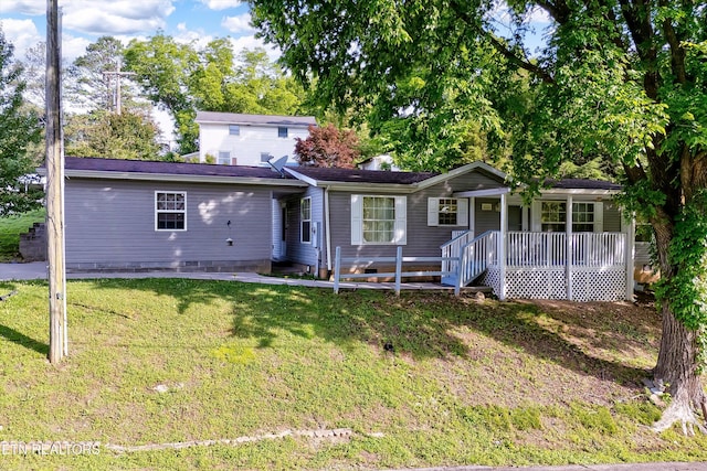 501 Park Ave, Clinton, TN 37716 - view of front of property featuring covered porch and a front yard