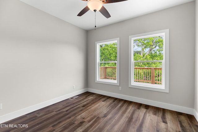 270 W Main St, Dandridge, TN 37725 - spare room featuring baseboards, dark wood-style floors, and a ceiling fan
