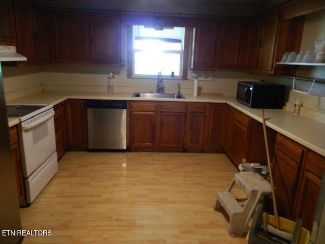 232 Sallings Rd, Luttrell, TN 37779 - kitchen with dishwasher, black microwave, a sink, electric range, and range hood