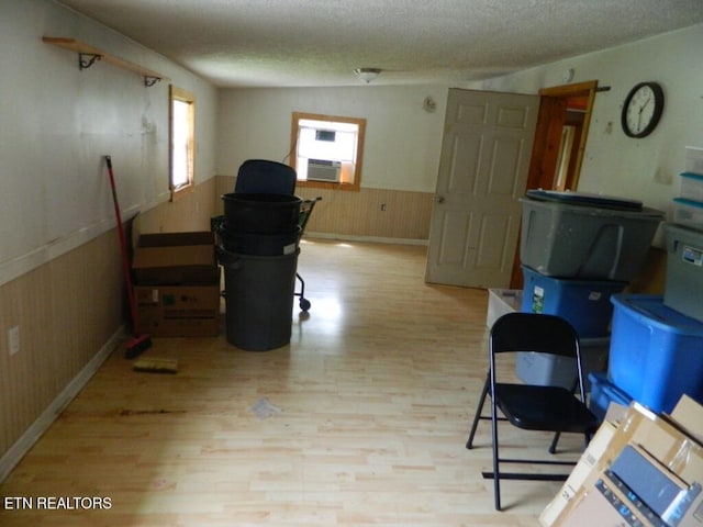 232 Sallings Rd, Luttrell, TN 37779 - office area with a wainscoted wall, wood finished floors, wood walls, a textured ceiling, and cooling unit
