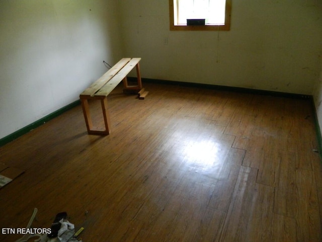 232 Sallings Rd, Luttrell, TN 37779 - spare room featuring wood finished floors and baseboards