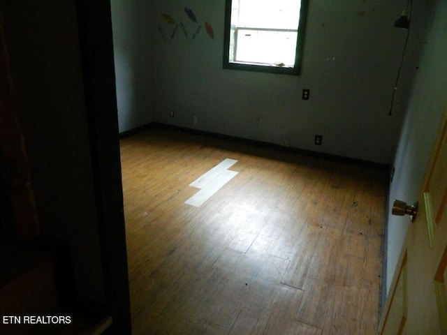 232 Sallings Rd, Luttrell, TN 37779 - unfurnished room with wood finished floors and baseboards