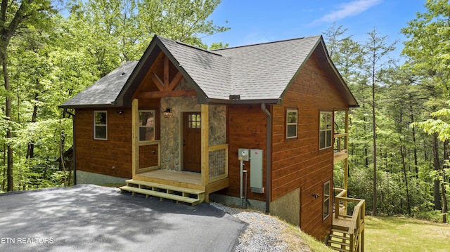 1705 Pkwy View Ct, Sevierville, TN 37876 - chalet / cabin with stone siding and roof with shingles