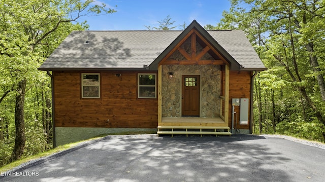 1705 Pkwy View Ct, Sevierville, TN 37876 - rustic home featuring stone siding and roof with shingles