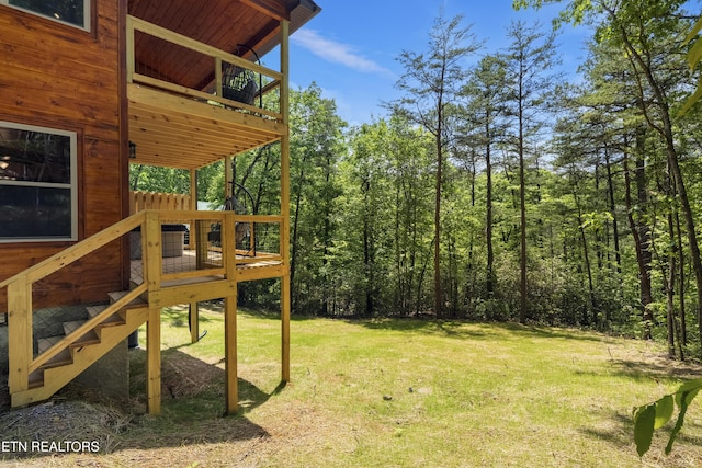 1705 Pkwy View Ct, Sevierville, TN 37876 - view of green lawn with a wooden deck