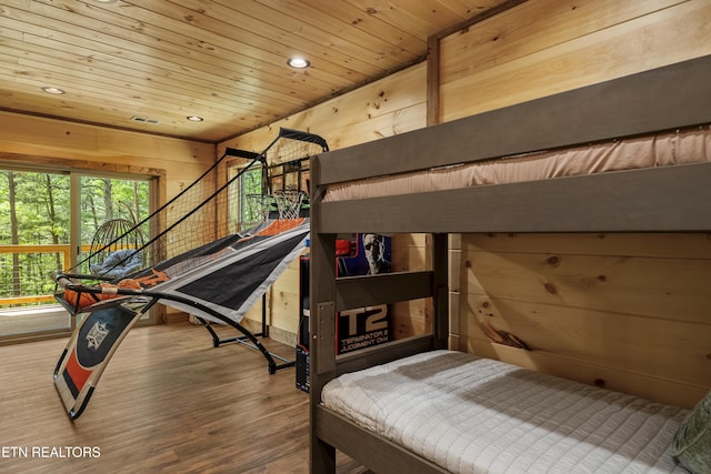 1705 Pkwy View Ct, Sevierville, TN 37876 - bedroom with wood ceiling, wood walls, recessed lighting, and wood finished floors