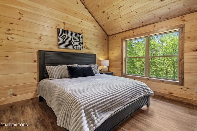 1705 Pkwy View Ct, Sevierville, TN 37876 - bedroom with vaulted ceiling, wood walls, wood finished floors, and wooden ceiling