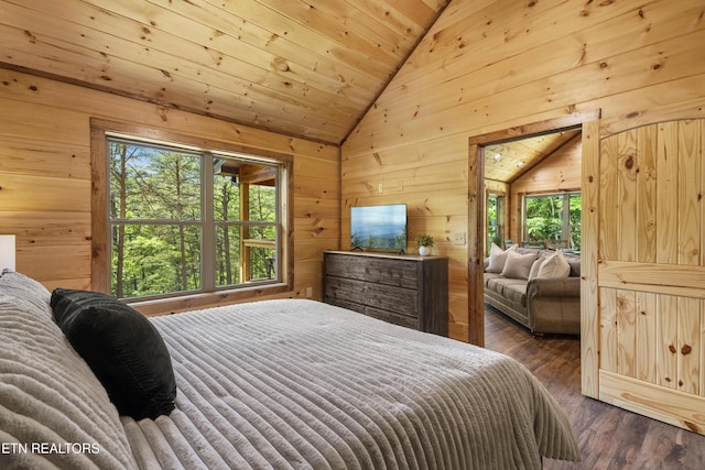 1705 Pkwy View Ct, Sevierville, TN 37876 - bedroom featuring lofted ceiling, wood walls, wood finished floors, and wooden ceiling