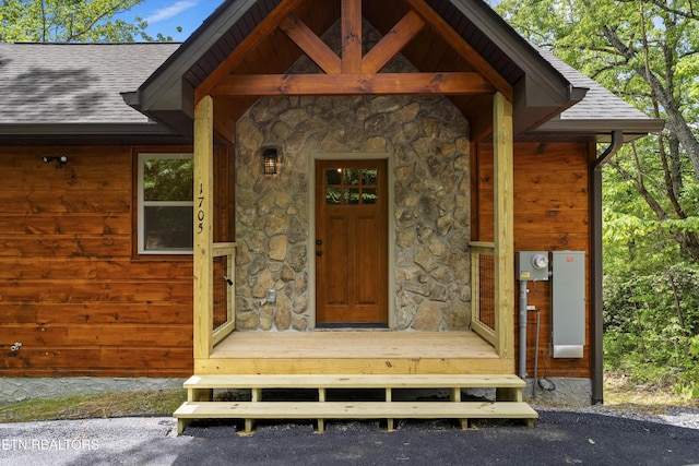 1705 Pkwy View Ct, Sevierville, TN 37876 - view of exterior entry featuring stone siding and a shingled roof