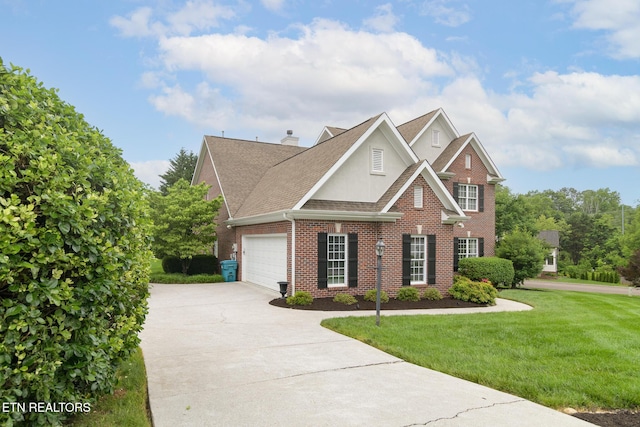 817 Vista Oaks Ln, Knoxville, TN 37919 - traditional home featuring concrete driveway, roof with shingles, brick siding, a garage, and a front lawn
