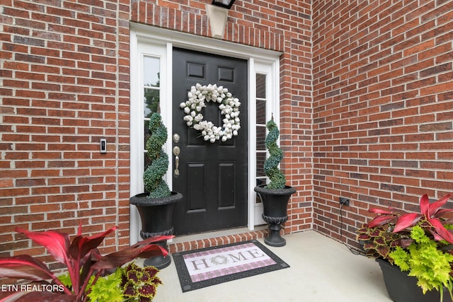 817 Vista Oaks Ln, Knoxville, TN 37919 - doorway to property featuring brick siding