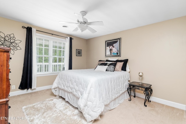 817 Vista Oaks Ln, Knoxville, TN 37919 - carpeted bedroom featuring baseboards and ceiling fan