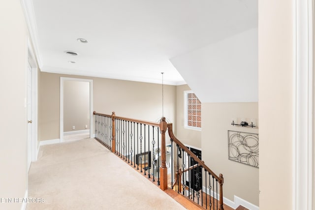 817 Vista Oaks Ln, Knoxville, TN 37919 - hallway featuring an upstairs landing, baseboards, ornamental molding, and light colored carpet