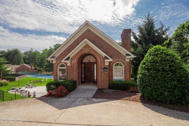 1403 Kenton Way, Knoxville, TN 37922 - view of front facade with brick siding and a chimney