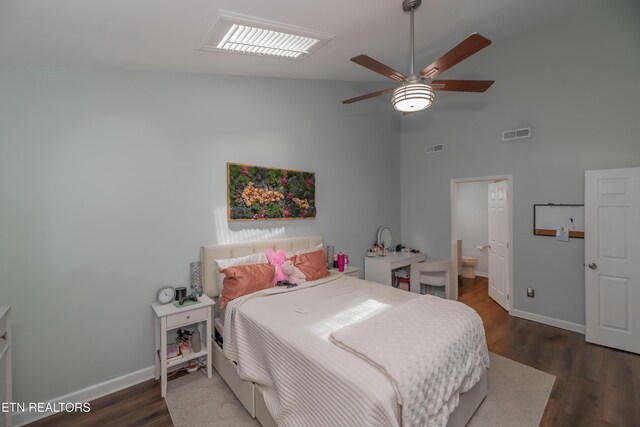 1403 Kenton Way, Knoxville, TN 37922 - bedroom featuring high vaulted ceiling, wood finished floors, baseboards, connected bathroom, and a ceiling fan