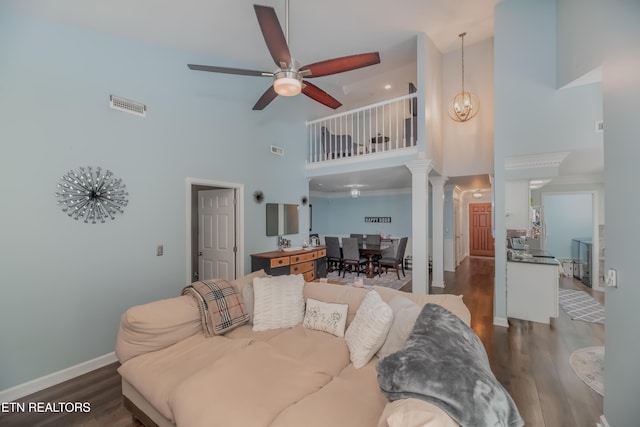 1403 Kenton Way, Knoxville, TN 37922 - living area with ceiling fan, a towering ceiling, wood finished floors, ornate columns, and baseboards