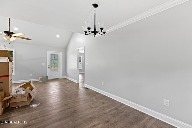136 Dudley Ln, Tazewell, TN 37879 - unfurnished living room featuring a chandelier, baseboards, dark wood-type flooring, lofted ceiling, and a ceiling fan