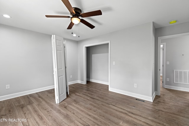 136 Dudley Ln, Tazewell, TN 37879 - unfurnished bedroom featuring wood finished floors, recessed lighting, baseboards, and a ceiling fan