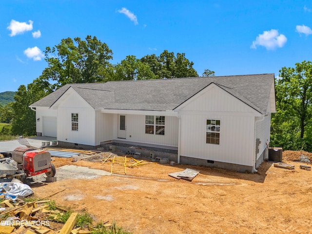 136 Dudley Ln, Tazewell, TN 37879 - back of house with crawl space, a shingled roof, an attached garage, and central air condition unit