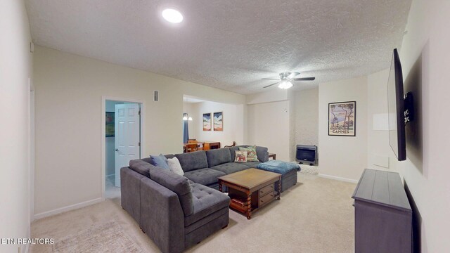 1859 Poplar Hill Rd, Knoxville, TN 37922 - living room featuring light colored carpet, a ceiling fan, baseboards, and a textured ceiling