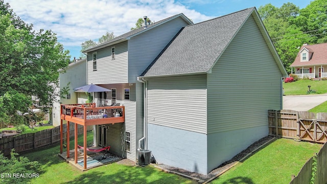 1859 Poplar Hill Rd, Knoxville, TN 37922 - back of property with a wooden deck, a shingled roof, and central AC unit