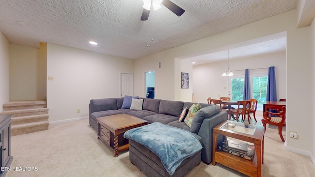 1859 Poplar Hill Rd, Knoxville, TN 37922 - living area with light carpet, a ceiling fan, stairway, a textured ceiling, and recessed lighting