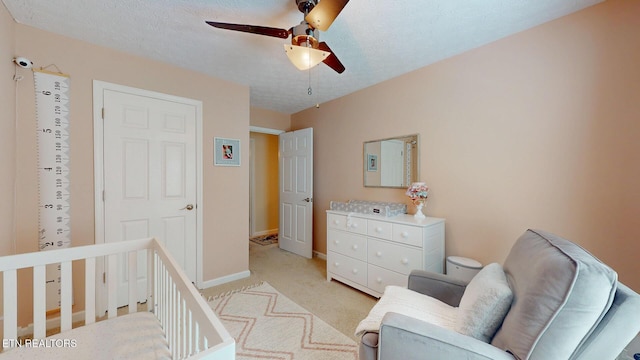 1859 Poplar Hill Rd, Knoxville, TN 37922 - bedroom featuring light colored carpet, baseboards, ceiling fan, and a textured ceiling