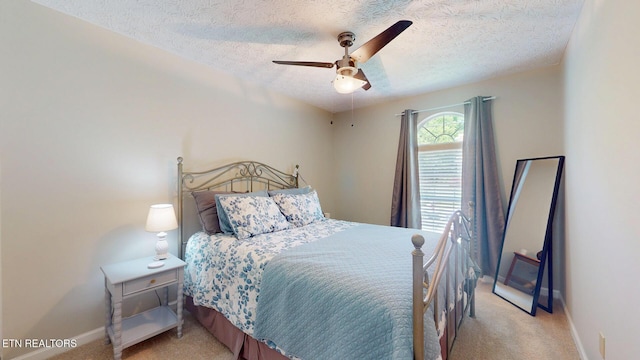 1859 Poplar Hill Rd, Knoxville, TN 37922 - bedroom with a textured ceiling, light colored carpet, baseboards, and ceiling fan