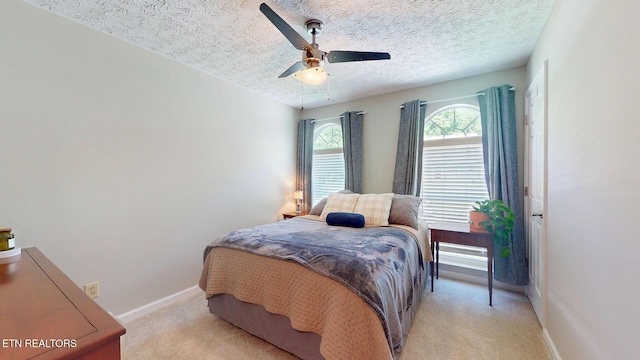 1859 Poplar Hill Rd, Knoxville, TN 37922 - bedroom featuring light colored carpet, baseboards, a textured ceiling, and a ceiling fan