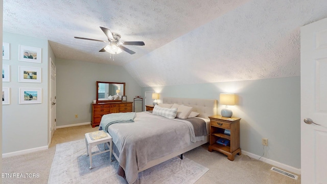 1859 Poplar Hill Rd, Knoxville, TN 37922 - bedroom featuring a textured ceiling, light carpet, vaulted ceiling, a ceiling fan, and baseboards