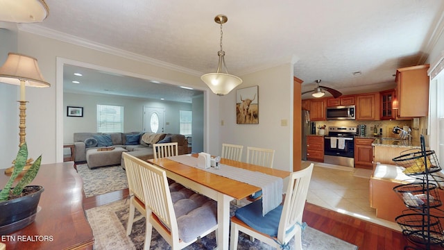 1859 Poplar Hill Rd, Knoxville, TN 37922 - dining room with crown molding and light wood finished floors