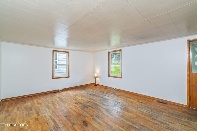 812 W Emerald Ave, Knoxville, TN 37921 - empty room featuring hardwood / wood-style floors and baseboards