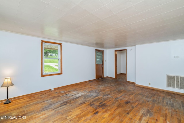 812 W Emerald Ave, Knoxville, TN 37921 - unfurnished room featuring hardwood / wood-style flooring and baseboards