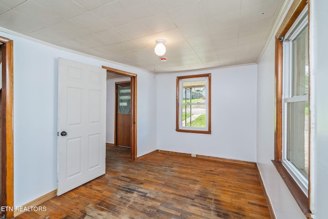812 W Emerald Ave, Knoxville, TN 37921 - unfurnished room with hardwood / wood-style flooring, crown molding, and baseboards
