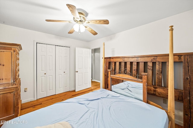 1103 Boles Beaty Rd, Alpine, TN 38543 - bedroom featuring wood finished floors, a ceiling fan, and a closet