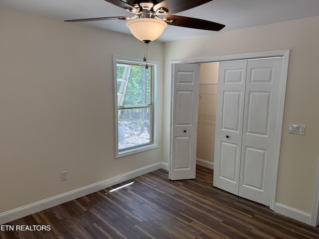 1847 Chinkapin Trl, Monterey, TN 38574 - unfurnished bedroom with dark wood-type flooring, baseboards, a closet, and a ceiling fan