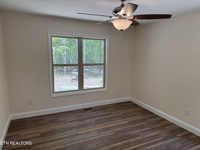 1847 Chinkapin Trl, Monterey, TN 38574 - spare room with dark wood-type flooring, ceiling fan, and baseboards