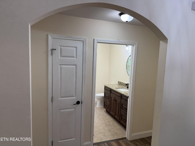 1847 Chinkapin Trl, Monterey, TN 38574 - bathroom featuring vanity, toilet, and wood finished floors