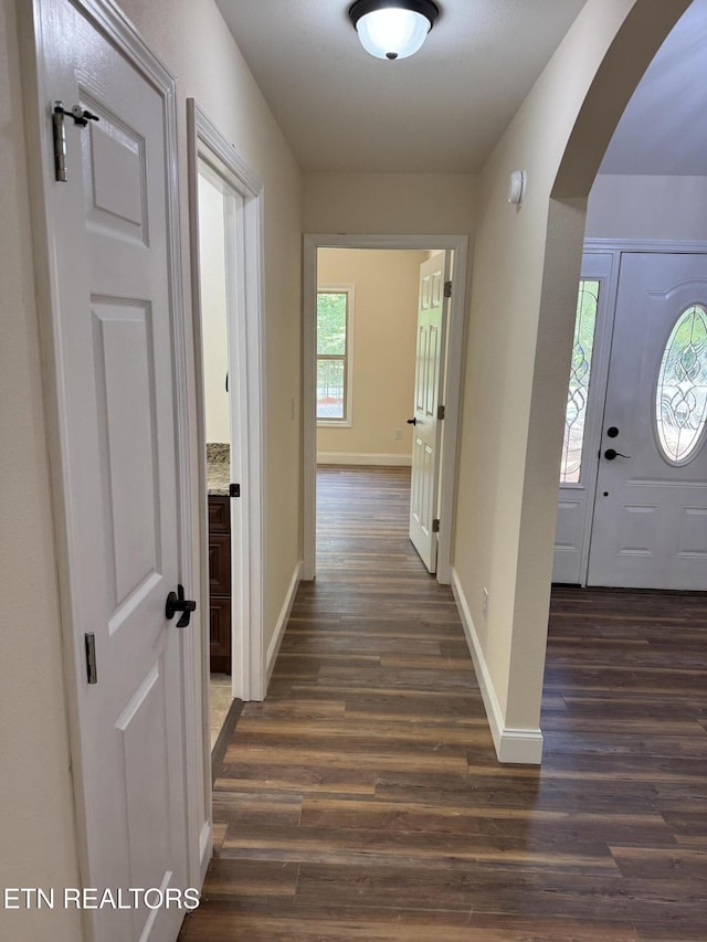 1847 Chinkapin Trl, Monterey, TN 38574 - corridor with arched walkways, dark wood-style floors, and baseboards
