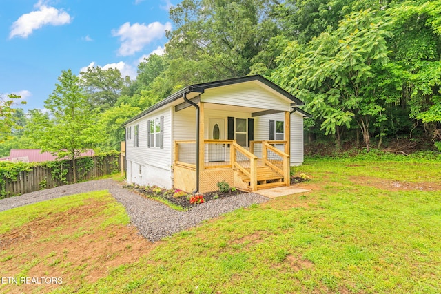 600 N Trinity Ave, Rockwood, TN 37854 - view of front facade featuring covered porch