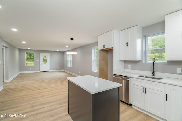 600 N Trinity Ave, Rockwood, TN 37854 - kitchen featuring a sink, stainless steel dishwasher, a center island, white cabinetry, and recessed lighting